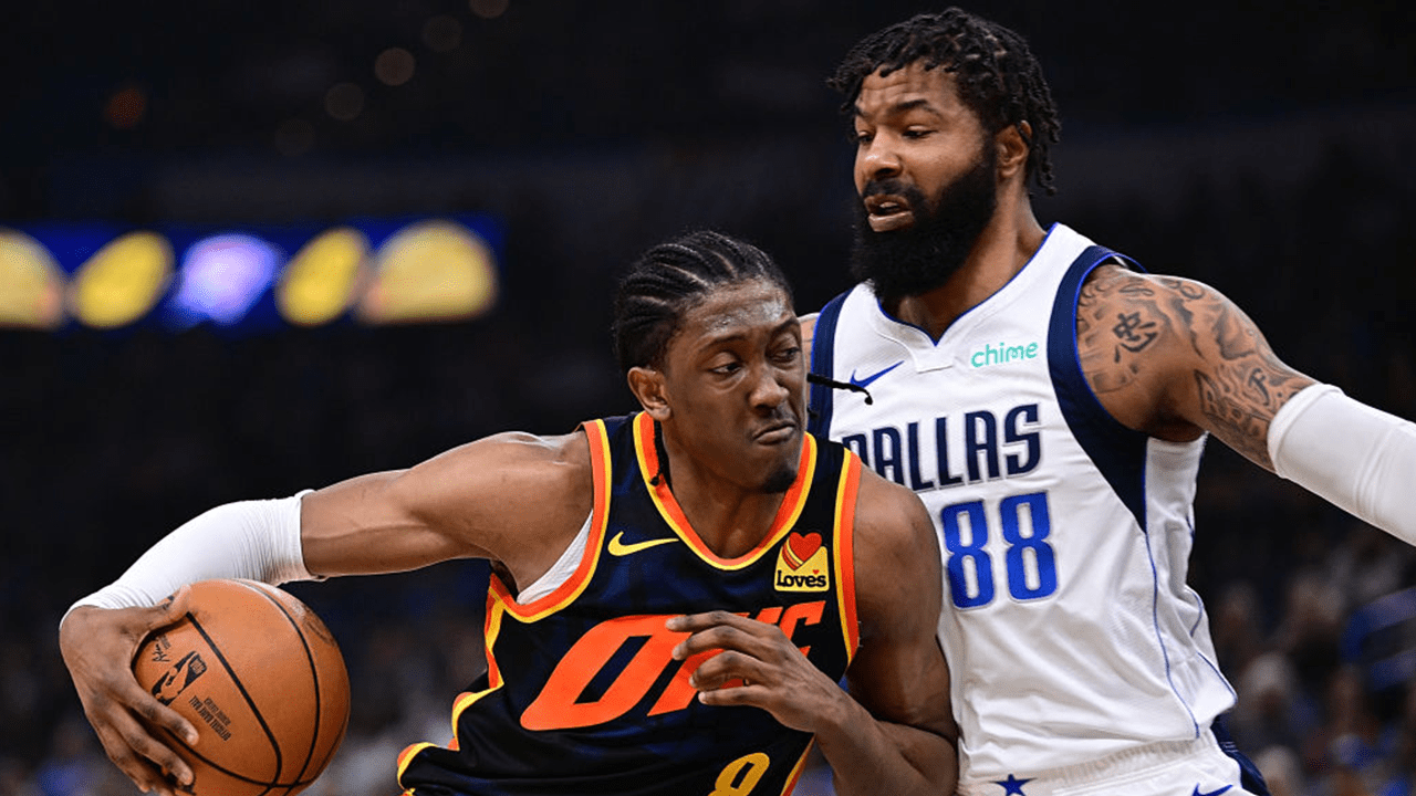 Jalen Williams #8 of the Oklahoma City Thunder handles the ball in front of Markieff Morris #88 of the Dallas Mavericks during the first half at Paycom Center on April 14, 2024 in Oklahoma City, Oklahoma.